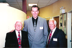 Dr. Stein next to Drs. Doug and Alex Cox, the chiropractor's chiropractors